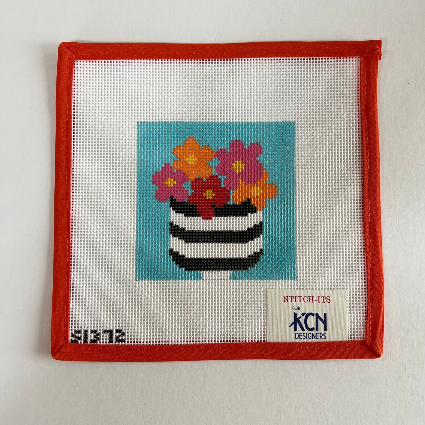 Flowers in Striped Pot